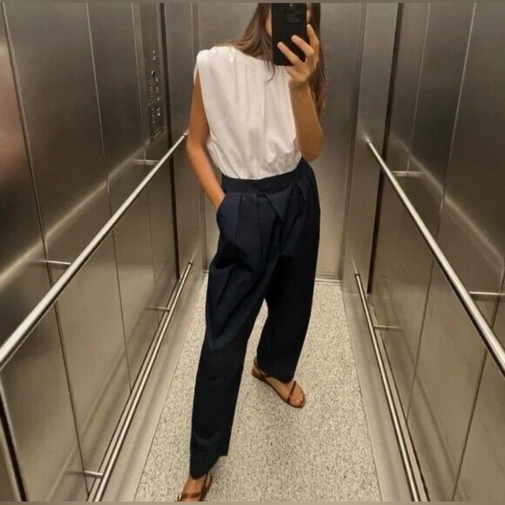 Zara White Sleeveless Top with Navy High-Waist Pleated Trousers
